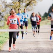 large-group-of-multi-generation-people-running-a-race-competition-in-nature.jpg